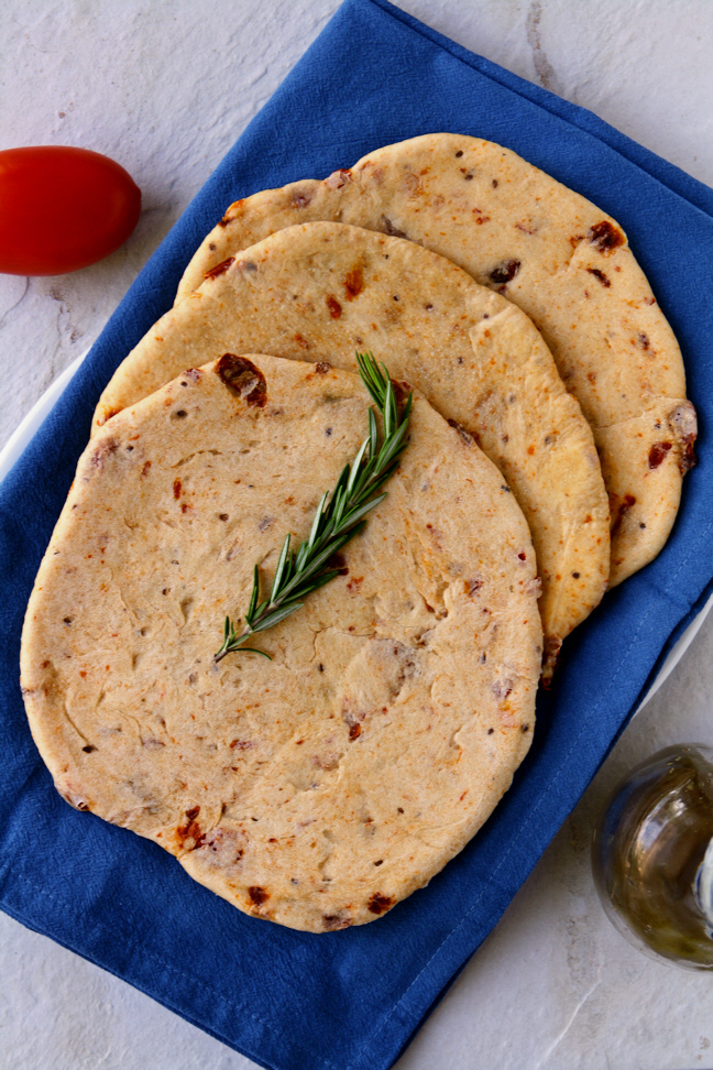 Sun-Dried Tomato Pita Bread to complement your favorite gyro fillings perfectly. Easy to make with only 7 ingredients, most of which you probably already have in your pantry. | www.heavenlyhomecooking.com