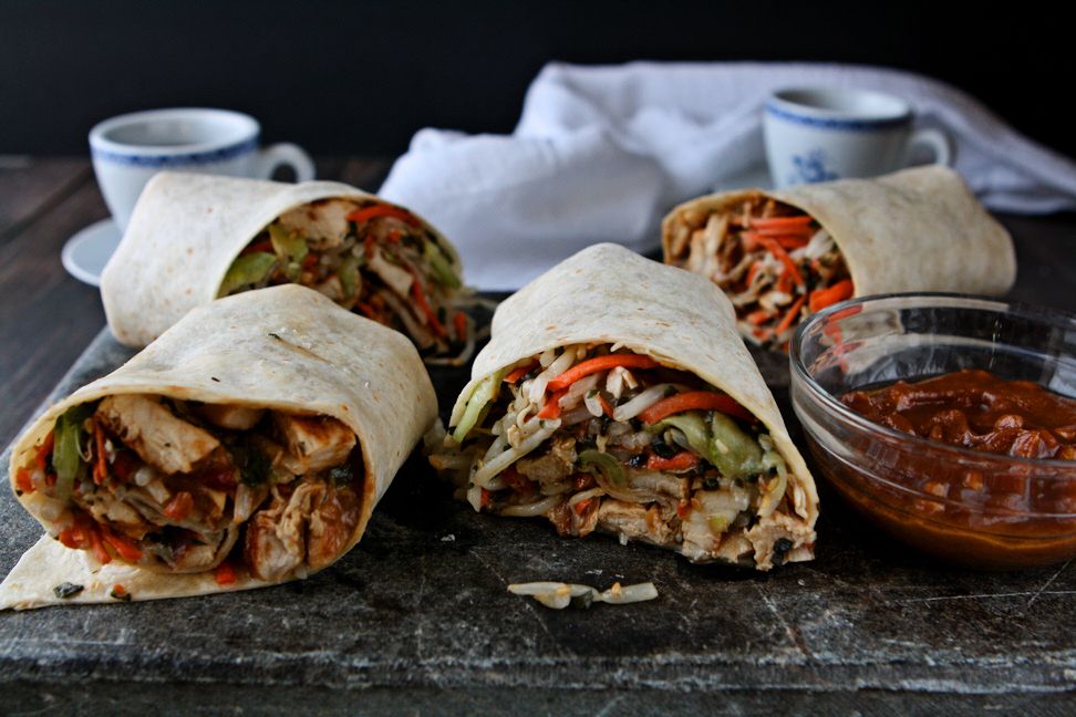 Grilled chicken, cucumber, bean sprout and carrot salad, dressed with a spicy peanut sauce and wrapped up in a flour tortilla. A delicious sandwich for lunch or dinner!