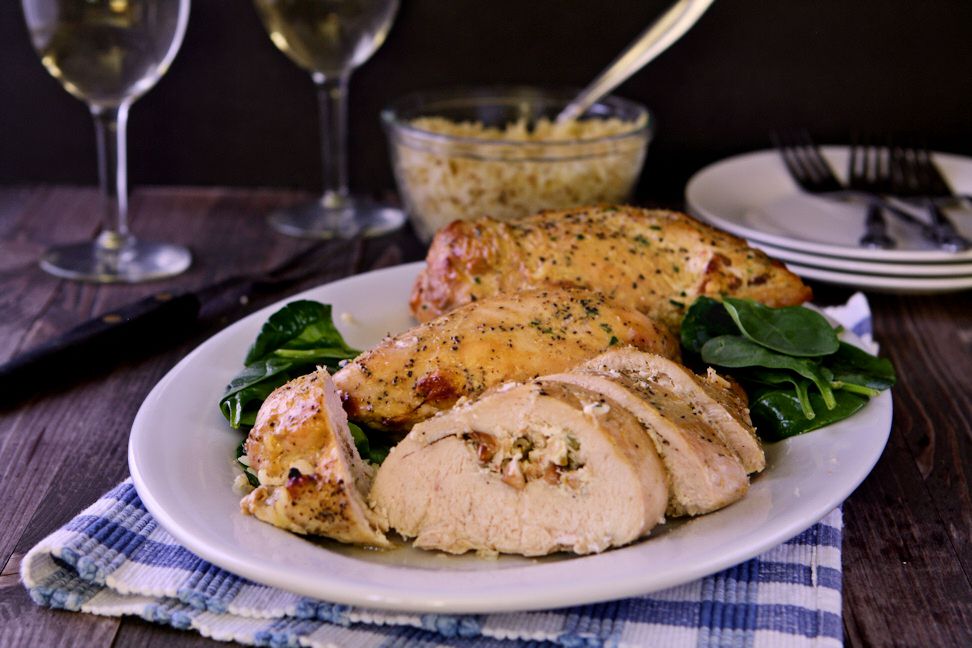 Garlic and Herb Stuffed Chicken Breast | Chicken breast stuffed with vegetable herb cream cheese, garlic and toasted pine nuts. An easy weeknight entree! | heavenlyhomecooking.com