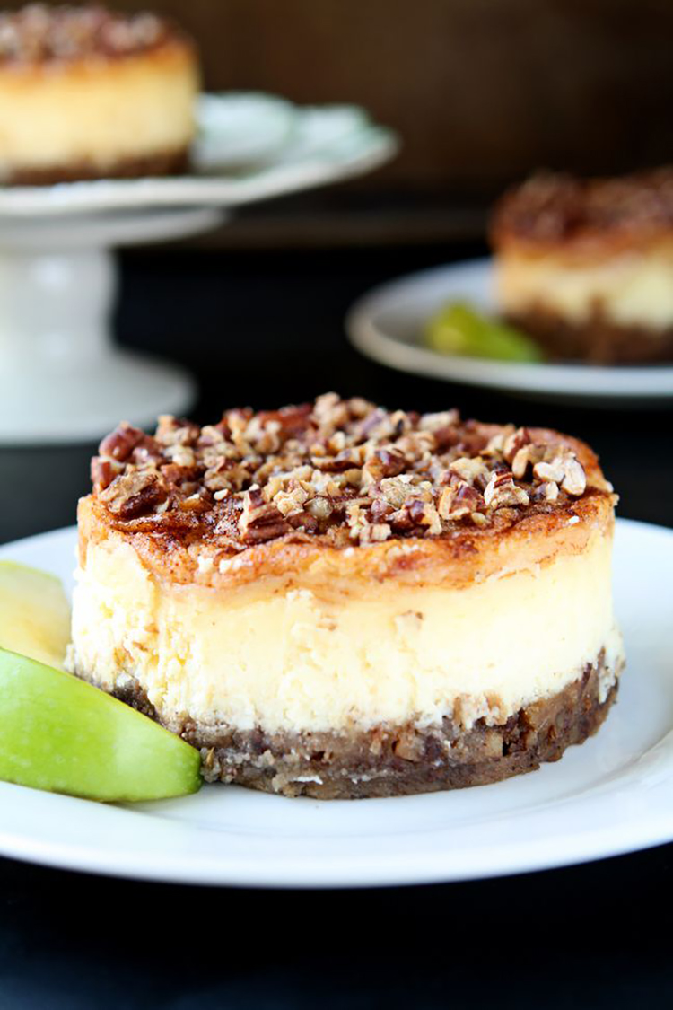Apple Pecan Cheesecake | Creamy and delicious individual cheesecakes topped with cinnamon, apples and pecans | heavenlyhomecooking.com