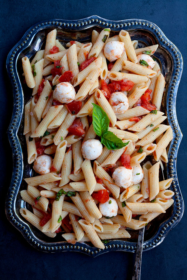 Pasta Caprese | Celebrate summer with this easy, fresh, light and tasty pasta caprese, made with fresh tomatoes and basil. | www.heavenlyhomecooking.com