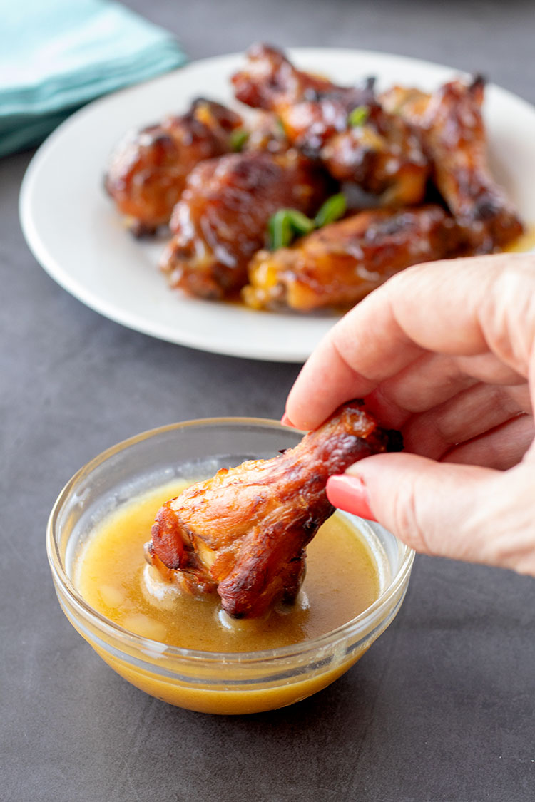 Sweet and Spicy Chicken Wings | Green hot pepper sauce and jalapenos give these wings the spicy, honey gives them the sweet. It's a complementary pairing that will bring you back for more again and again. | www.heavenlyhomecooking.com