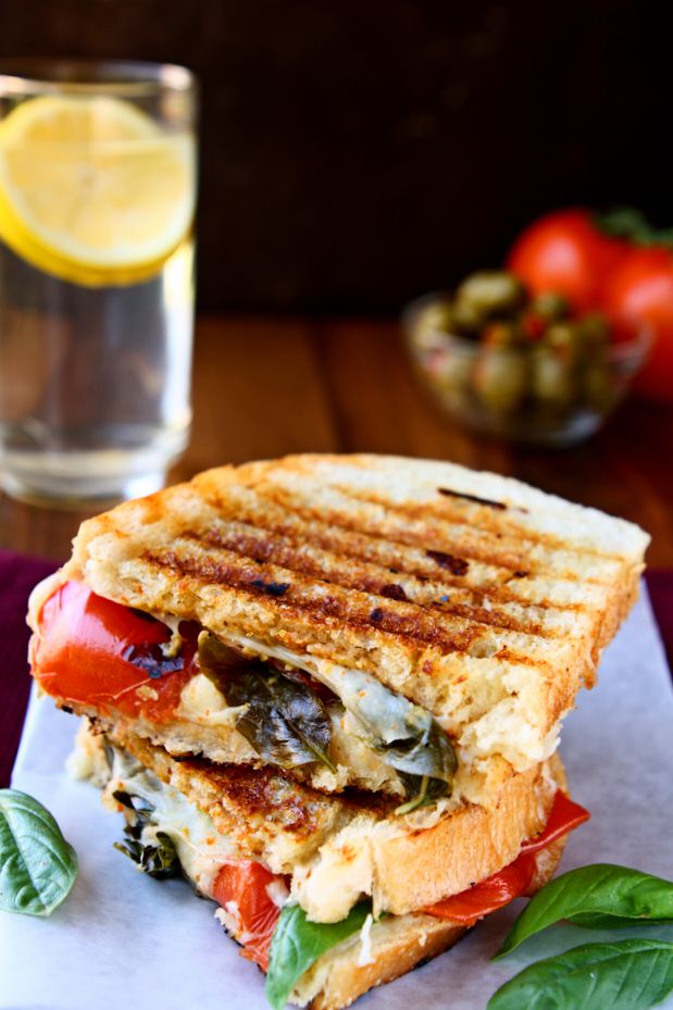 Caprese Panini Sandwich | The classic flavors of a Caprese salad all wrapped up in a crisp panini sandwich and grilled to perfection! | www.heavenlyhomecooking.com