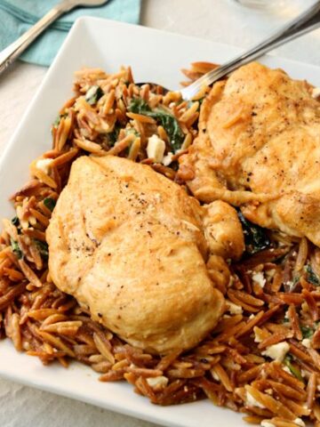 A simple and delicious one skillet chicken and orzo pasta dish for two. The ideal weeknight supper. You can have this on the table in less than 45 minutes.