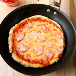 Skillet Pizza | Use the toppings of your choice, homemade sauce and make a surefire crispy pizza in your skillet. No more saggy and soggy pizza slices! | www.heavenlyhomecooking.com