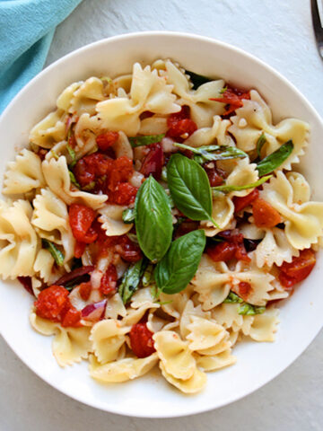 Bowtie pasta in a white bowl