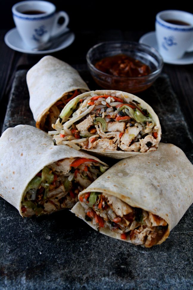 Grilled chicken, cucumber, bean sprout and carrot salad, dressed with a spicy peanut sauce and wrapped up in a flour tortilla. A delicious sandwich for lunch or dinner!