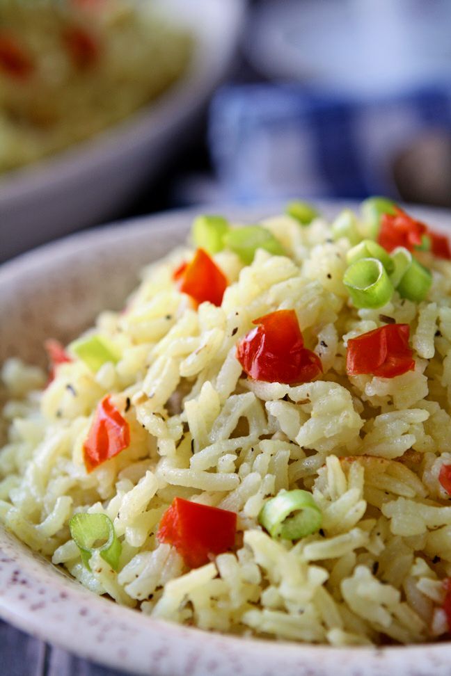 Garlic and Herb Long Grain Rice | Flavorful, moist and delicious, this is not the usual bland rice. Flavored with chicken broth, garlic and herbs, it will become one of your favorite side dishes!| heavenlyhomecooking.com