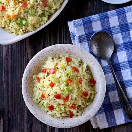 Garlic and Herb Long Grain Rice | Flavorful, moist and delicious, this is not the usual bland rice. Flavored with chicken broth, garlic and herbs, it will become one of your favorite side dishes!| heavenlyhomecooking.com