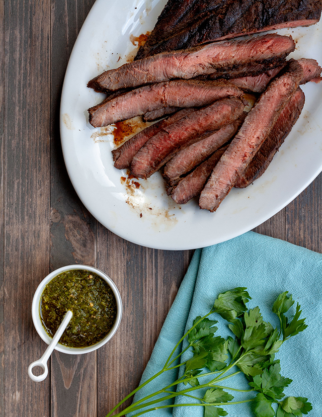 Flat Iron Steak with Chimichurri | This steak practically melts in your mouth. The zesty chimi sauce is the perfect complement. It has just the right kick. Yummy! | www.heavenlyhomecooking.com