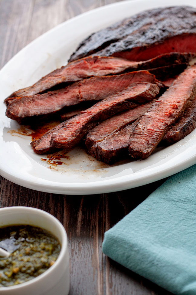 Flat Iron Steak with Chimichurri | This steak practically melts in your mouth. The zesty chimi sauce is the perfect complement. It has just the right kick. Yummy! | www.heavenlyhomecooking.com