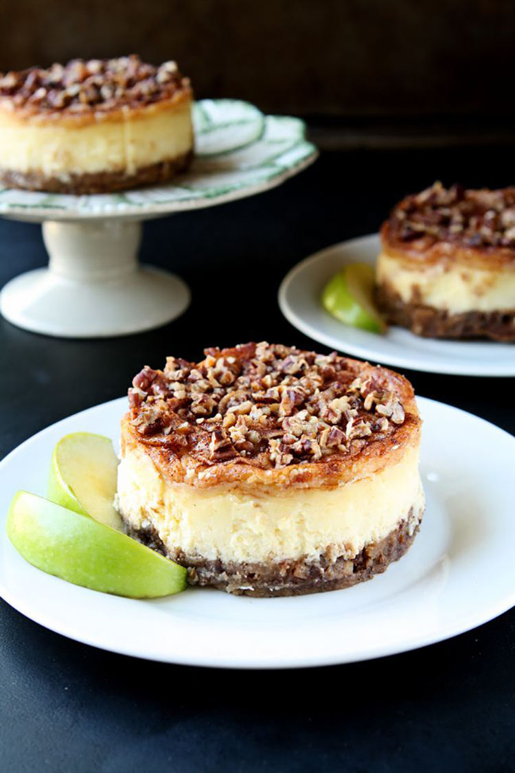 Apple Pecan Cheesecake | Creamy and delicious individual cheesecakes topped with cinnamon, apples and pecans | heavenlyhomecooking.com