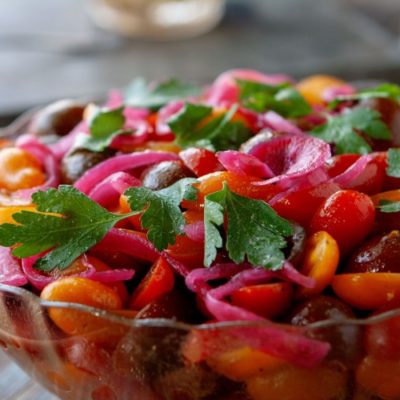 Tomato Salad | This easy, delicious, tangy tomato salad is the perfect summer side dish. Bring it to your next BBQ for rave reviews! | www.heavenlyhomecooking.com