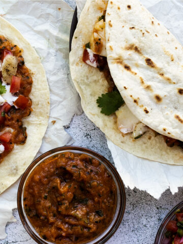 Grilled cod fish tacos with roasted tomato salsa