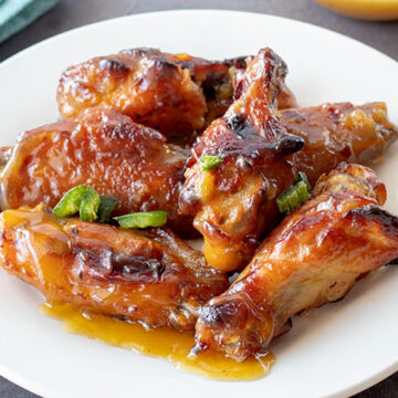 Sweet & Spicy Chicken Wings on a white plate