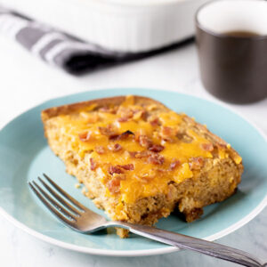 Pancake Breakfast Casserole | This hearty and healthy whole grain pancake breakfast casserole packs 15 grams of protein that will keep you satisfied all morning. It's the perfect brunch recipe idea that will free you from the griddle so that you can enjoy the company of your guests. It is also a great make ahead and freeze breakfast recipe. Serve with warm maple syrup. | www.heavenlyhomecooking.com