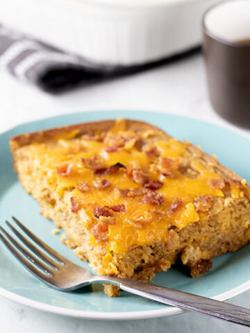 Pancake Breakfast Casserole | This hearty and healthy whole grain pancake breakfast casserole packs 15 grams of protein that will keep you satisfied all morning. It's the perfect brunch recipe idea that will free you from the griddle so that you can enjoy the company of your guests. It is also a great make ahead and freeze breakfast recipe. Serve with warm maple syrup. | www.heavenlyhomecooking.com