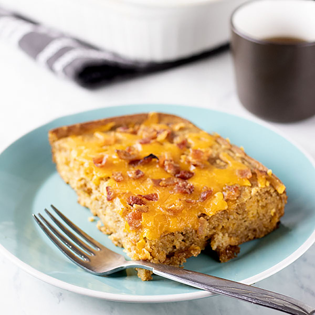 Pancake breakfast casserole sitting on a blue plate