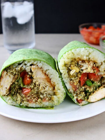 Pesto grilled chicken wrap on a white plate