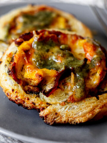 Breakfast pinwheels on a grey plate