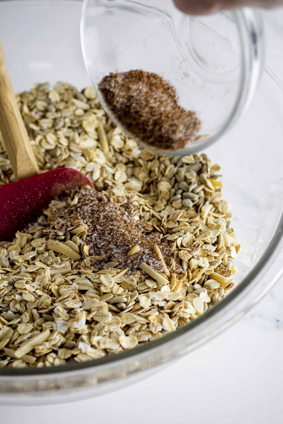 Spices being added to dry ingredients