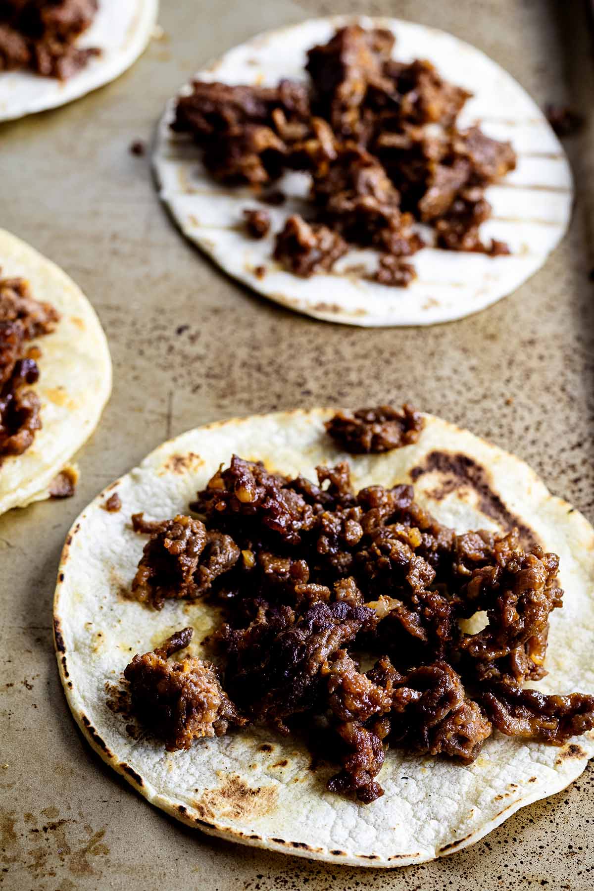 Cooked chorizo on tacos