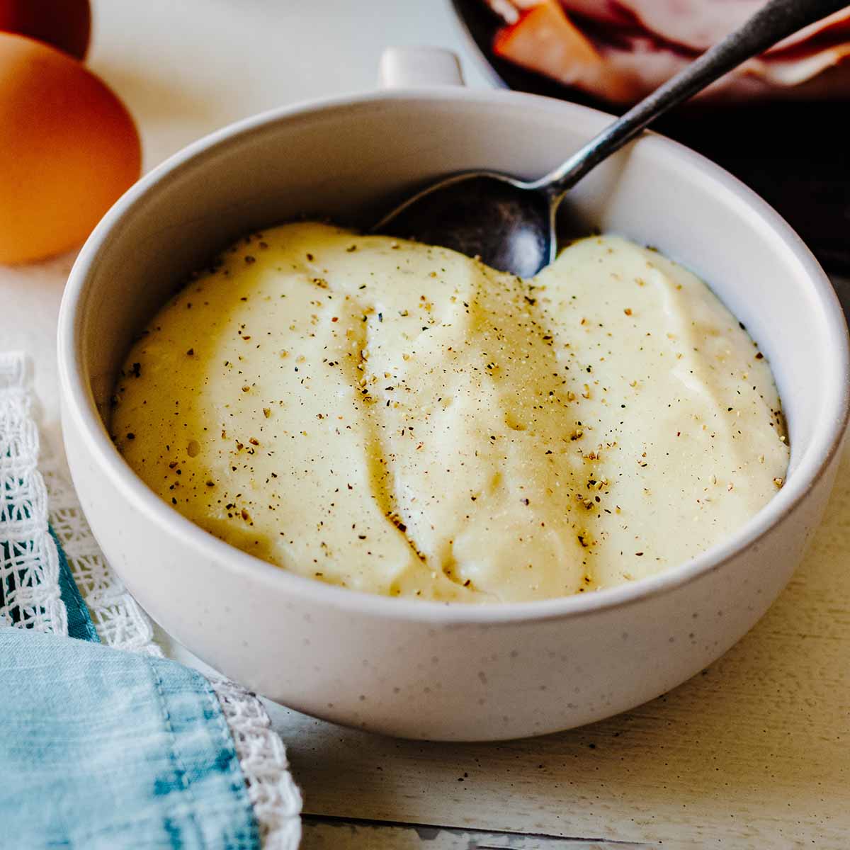 Bowl of croque madame sauce