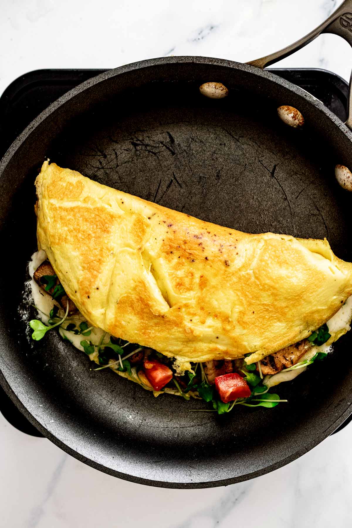 Cooked omelette in a skillet
