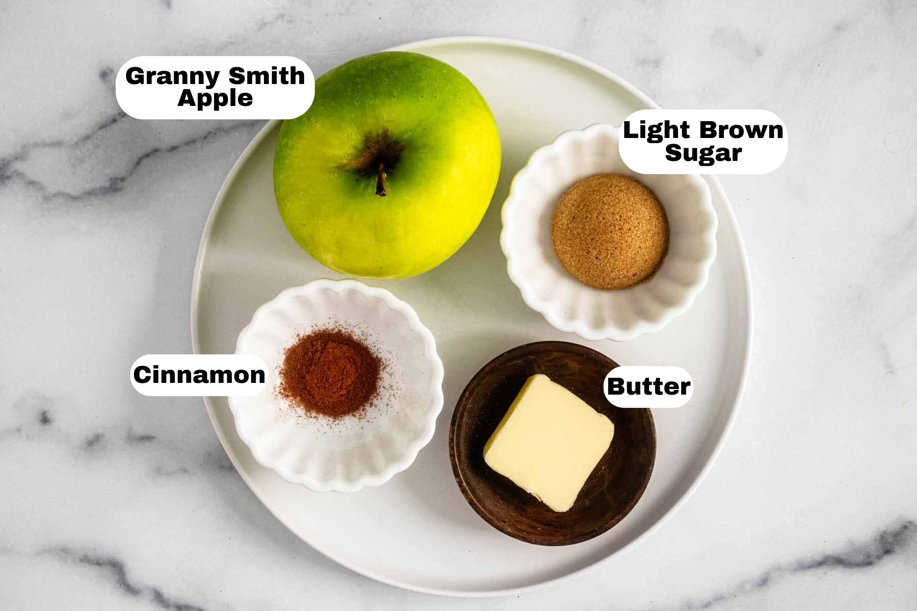 Apple topping ingredients: Granny Smith apple, light brown sugar, cinnamon, butter.