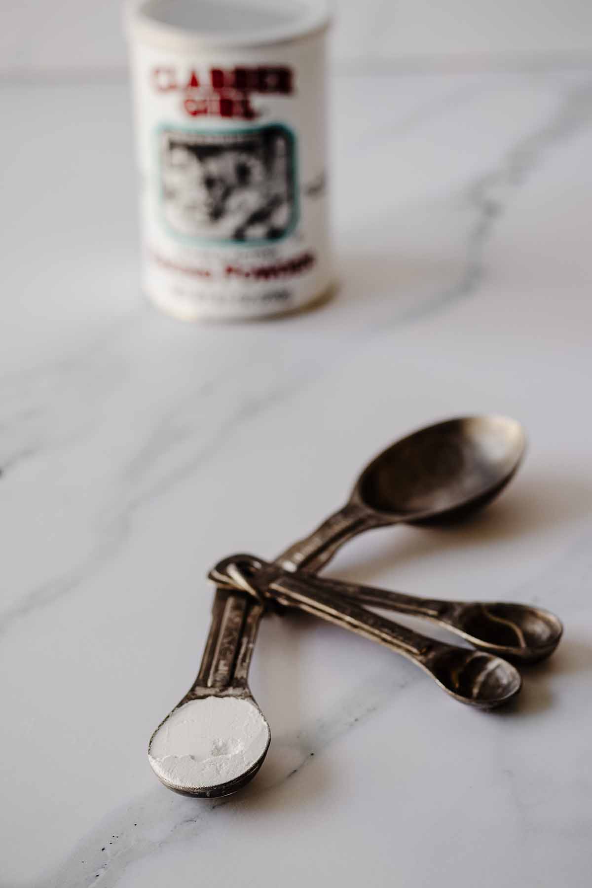 Baking powder in a measuring spoon