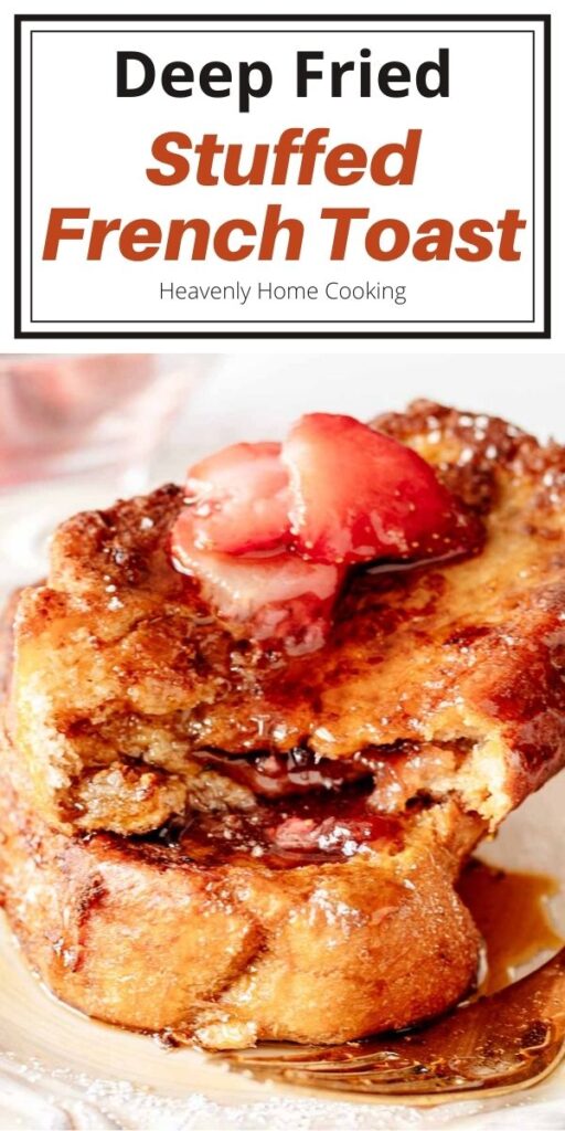 Deep fried stuffed French toast cut up to reveal strawberry filling