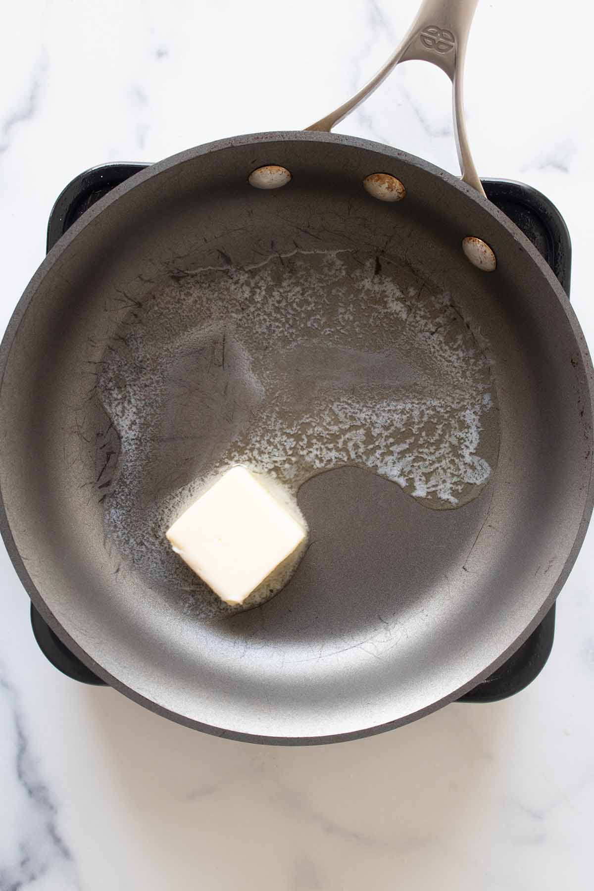 Butter melting in a skillet