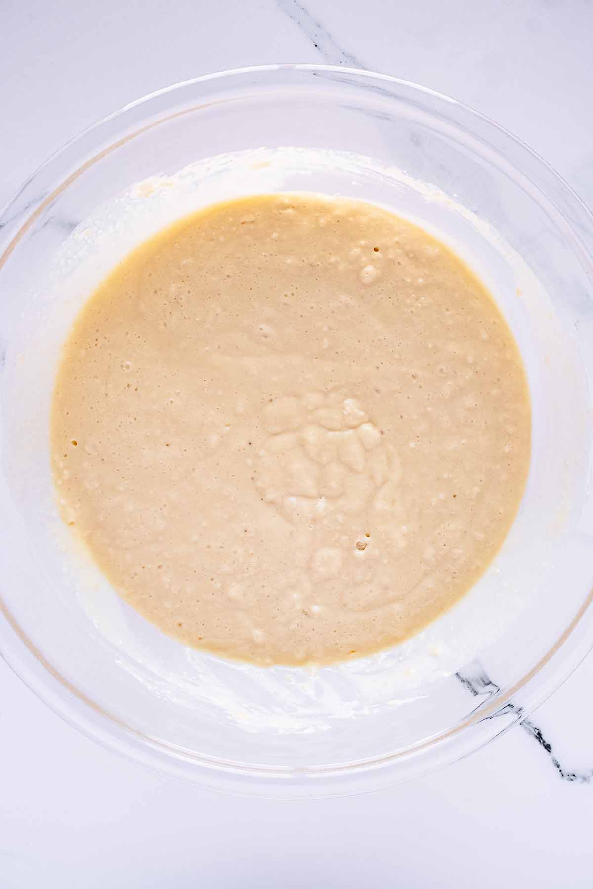 Overhead view of batter in a glass bowl