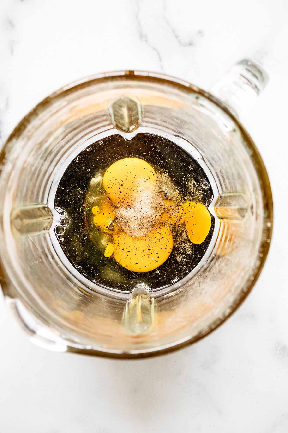 Eggs and salt and pepper in a blender