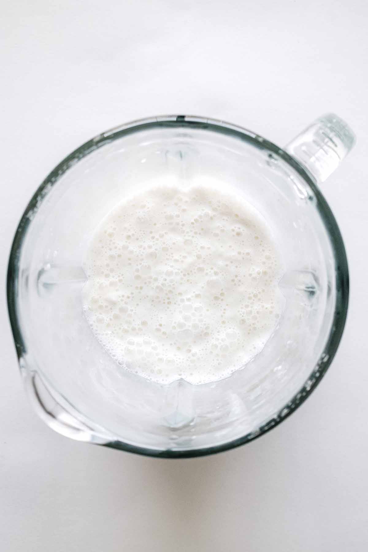 Overhead view of all ingredients blended and frothy