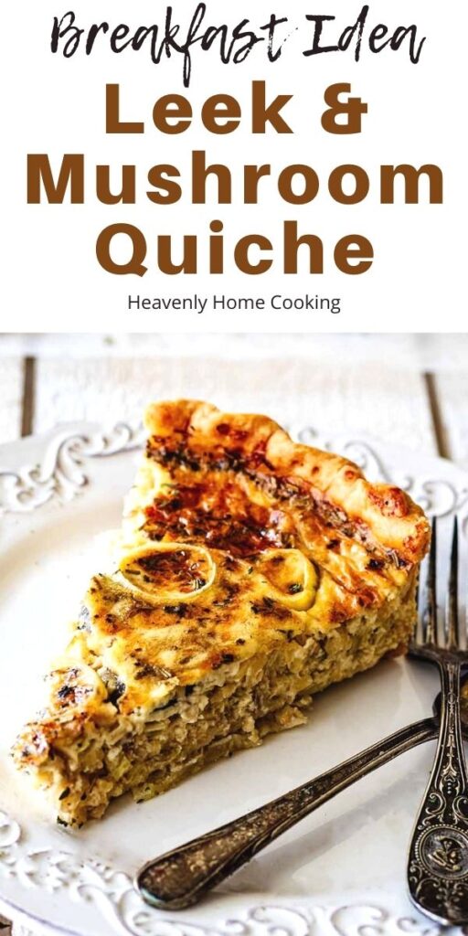 Slice of quiche on a white plate with two forks with text overlay "Breakfast Idea. Leek & Mushroom Quiche"