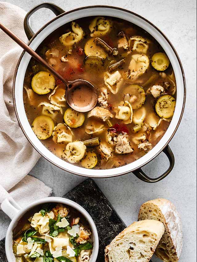Chicken tortellini soup in a soup pot