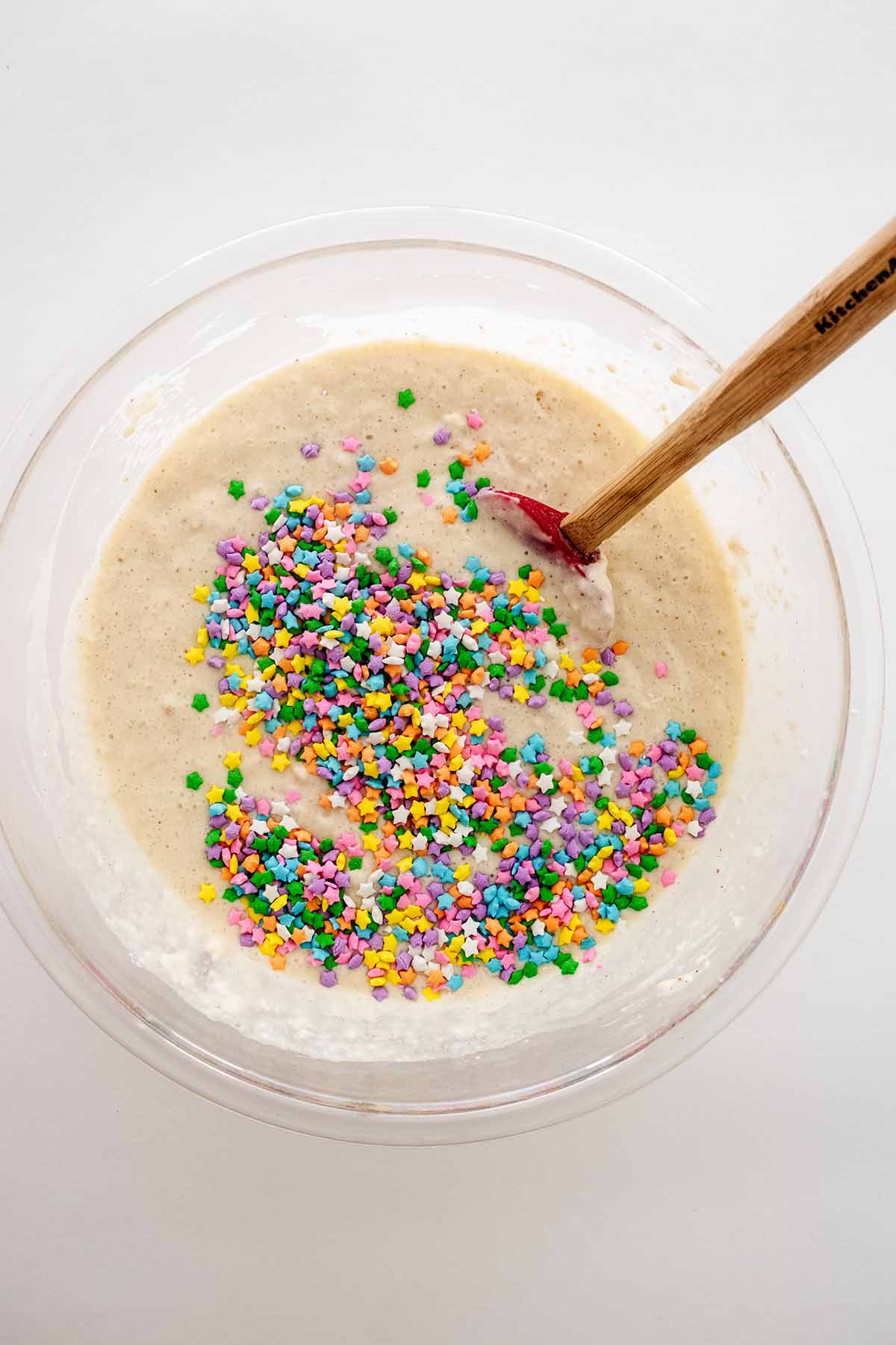 Batter and sprinkles in a large glass bowl