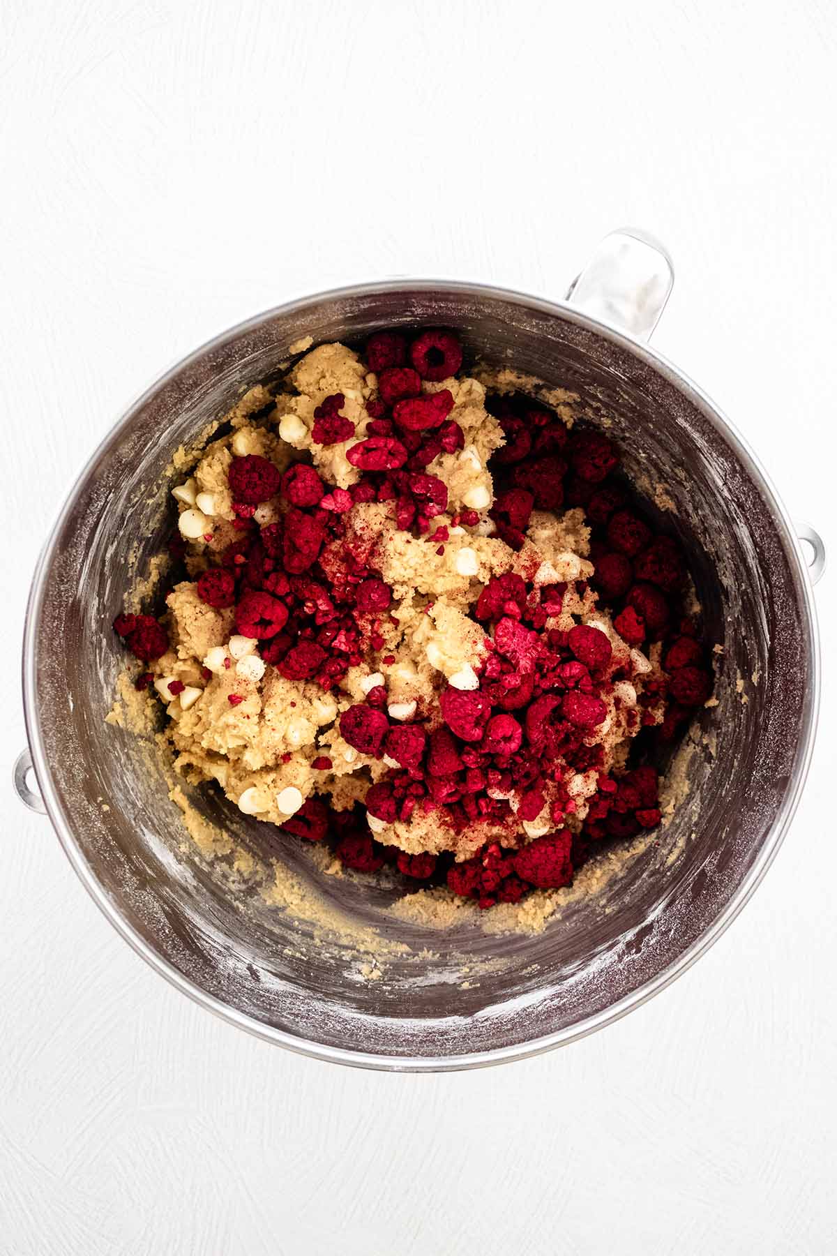 Freeze dried raspberries with the cookie dough in a stand mixer bowl.