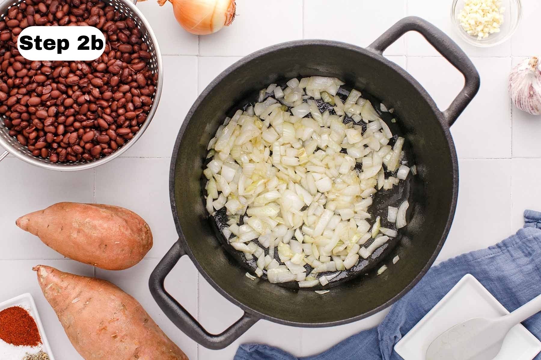 Lightly browned cooked chopped onion in a soup pot