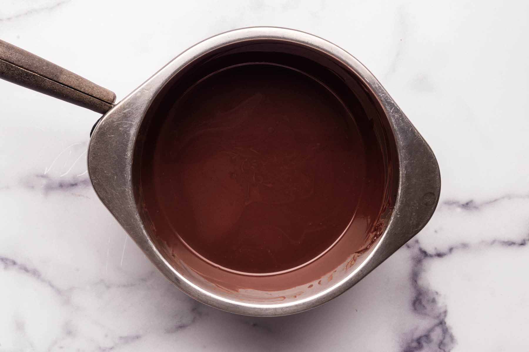 Melted chocolate and shortening in the top pan of a double boiler