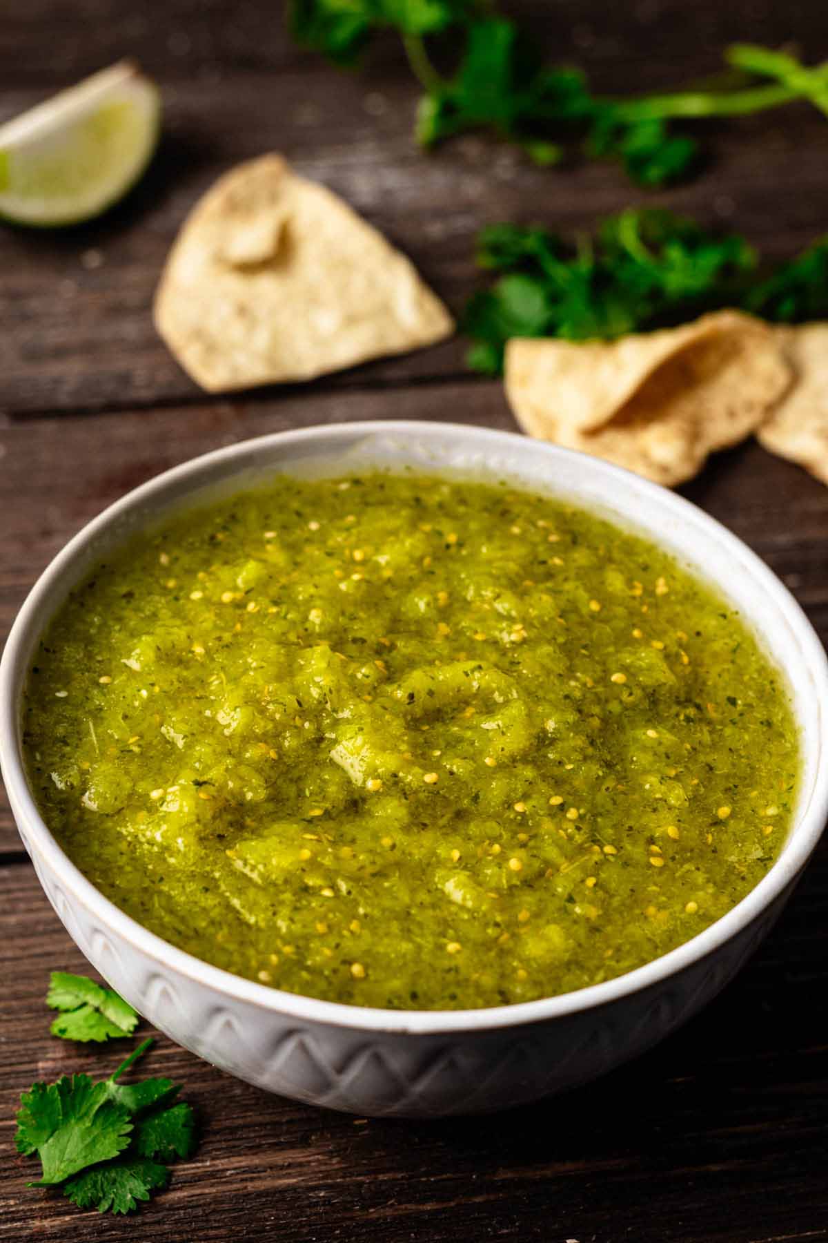 Tomatillo salsa in a small grey bowl