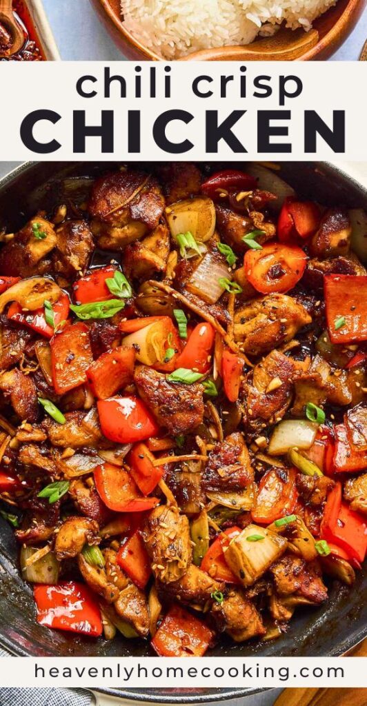 Close up of chili crisp chicken in a skillet with text overlay