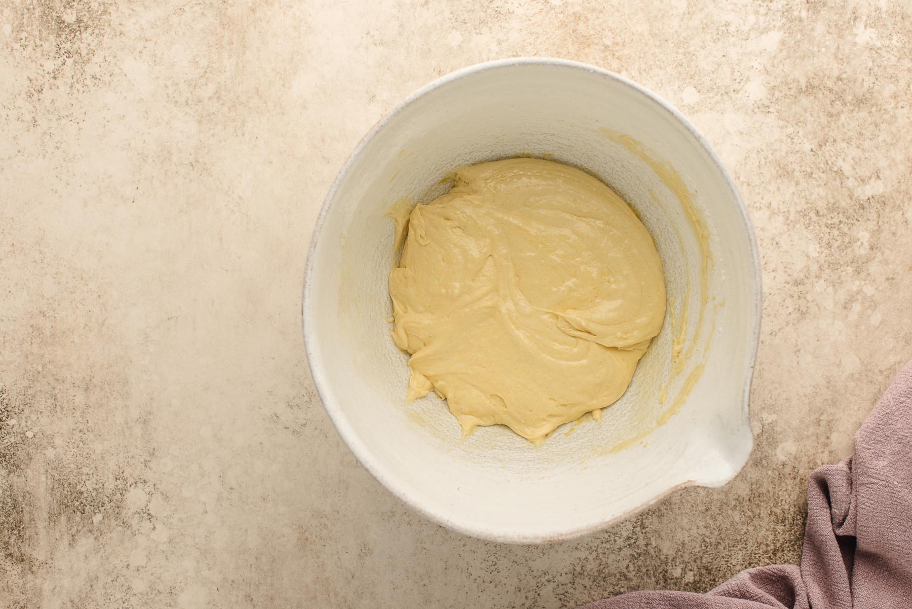 Batter fully mixed and smooth, ready to transfer to piping bag.