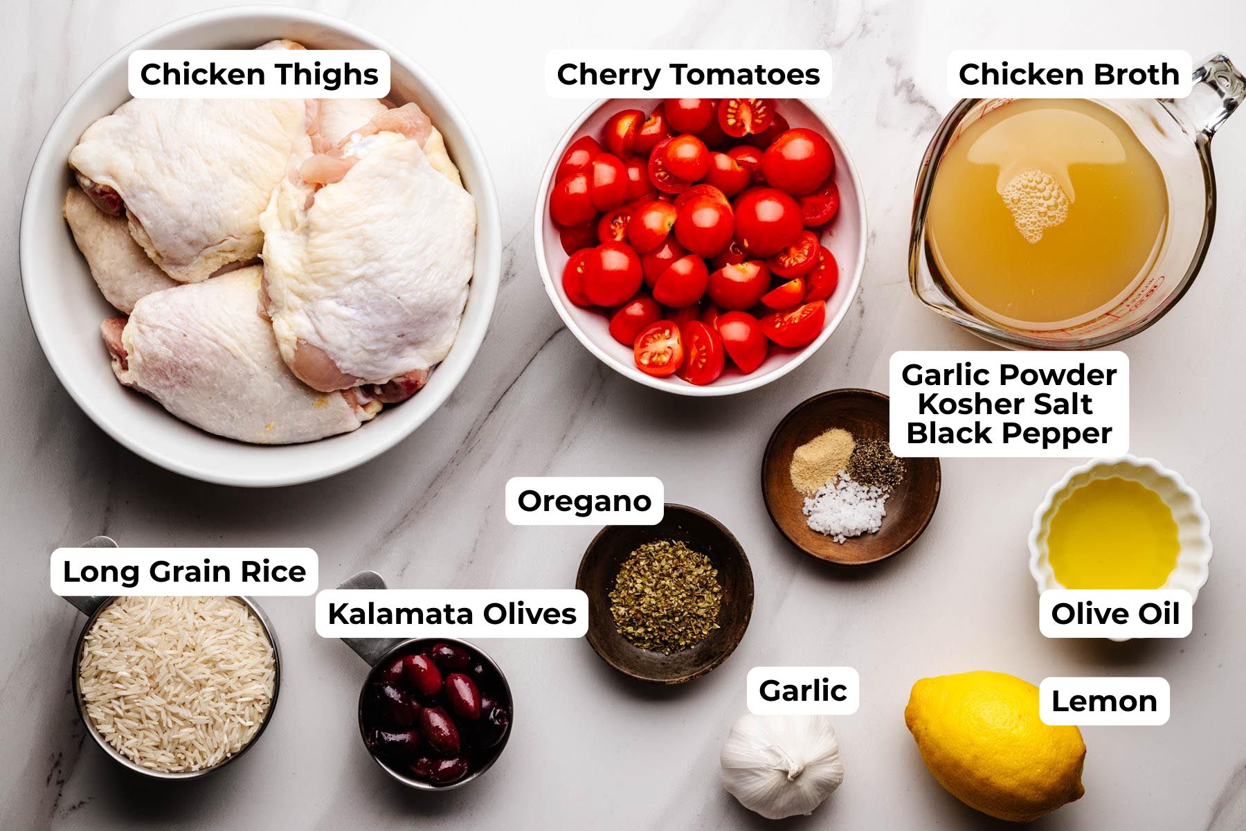 Ingredients for Greek Chicken and Rice: thighs, rice, broth, cherry tomatoes, olives, garlic, oregano, lemon, oil, salt, pepper.