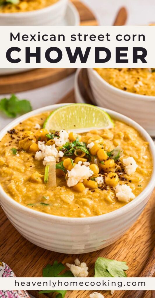 Close-up of Mexican street corn chowder in a white bowl, garnished with corn, cilantro, Cotija cheese, and a lime wedge, with bold “Mexican street corn chowder” text and the Heavenly Home Cooking URL.
