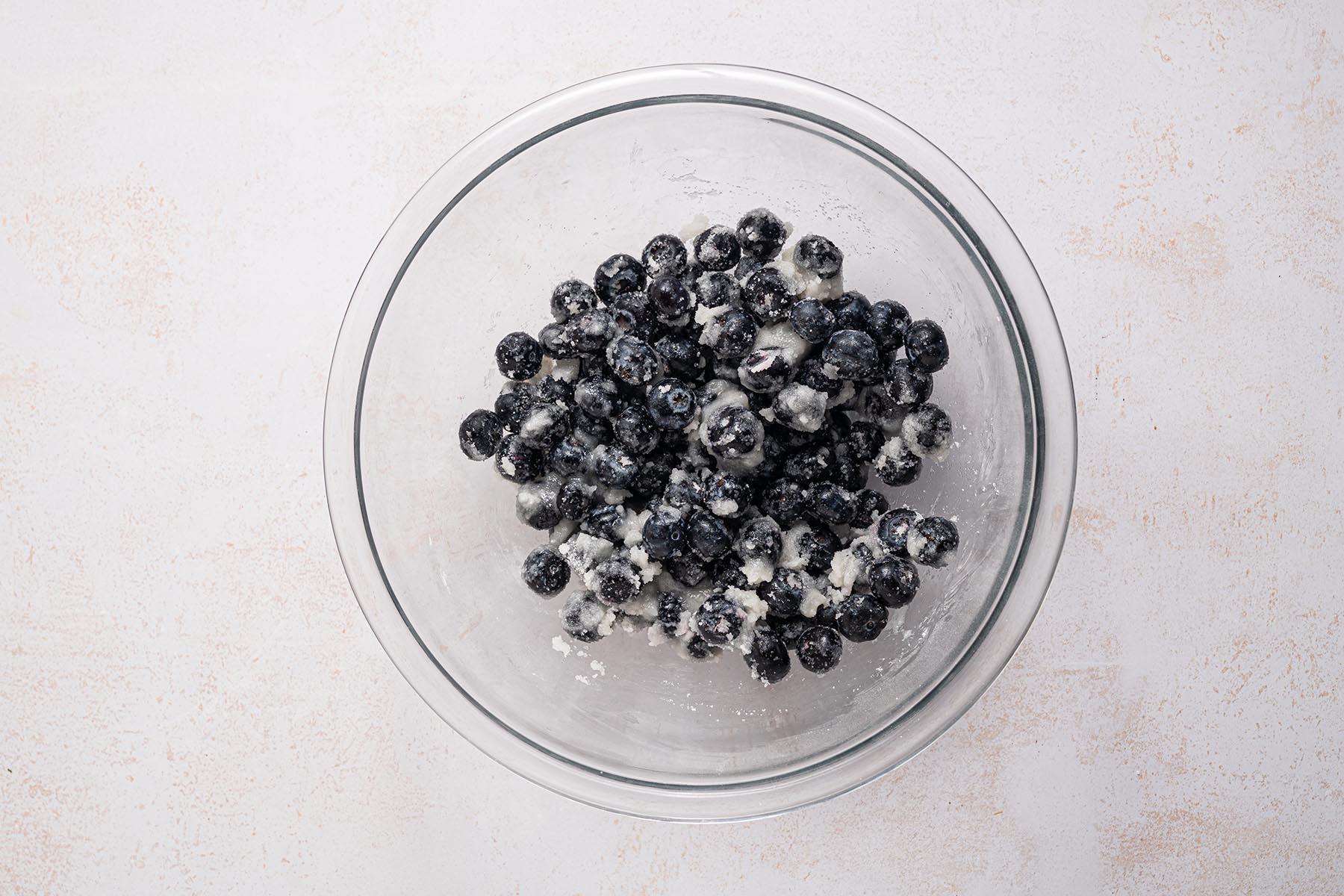 Fresh blueberries coated in sugar and cornstarch mixture.