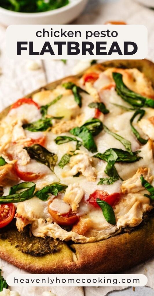 Chicken pesto flatbread topped with melted mozzarella, shredded chicken, cherry tomatoes, and fresh basil on a golden flatbread crust. Vertical Pinterest pin for an easy chicken flatbread recipe from Heavenly Home Cooking.