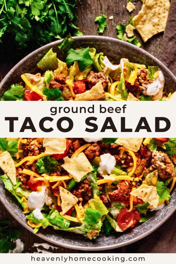 Ground beef taco salad with seasoned beef, lettuce, cheddar cheese, tortilla chips, tomatoes, black beans, cilantro, and creamy dressing in a dark bowl on a wooden surface. Vertical Pinterest pin for an easy taco salad recipe from Heavenly Home Cooking.