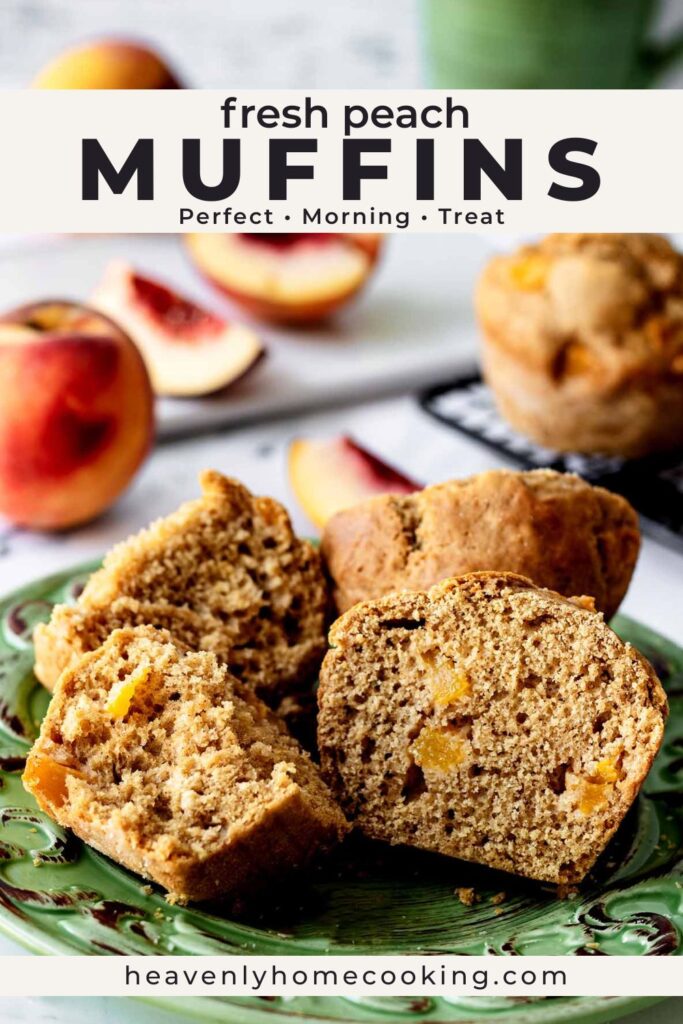 Fresh peach muffins split open on a green plate showing a soft, moist interior filled with peach pieces, with fresh peaches and more muffins in the background. Vertical Pinterest pin for homemade peach muffins from Heavenly Home Cooking.